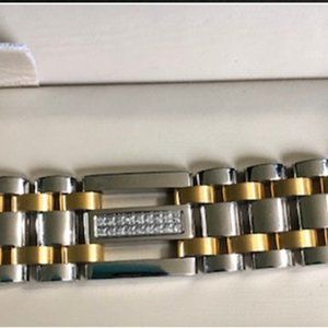 8.5 inch two-tone gold/silver men's bracelet.  Never worn.